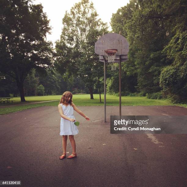 girl and basketball court - newnaivetytrend stock-fotos und bilder