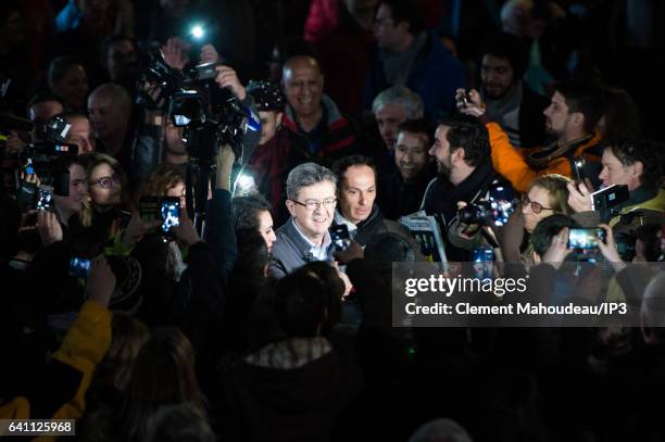 Founder of the left wing movement 'La France Insoumise' and candidate for the 2017 French Presidential Election Jean Luc Melenchon is surrounded by...