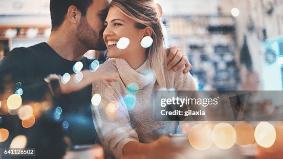 Couple on a romantic date at a coffee house. Couple on a romantic date at a coffee house.