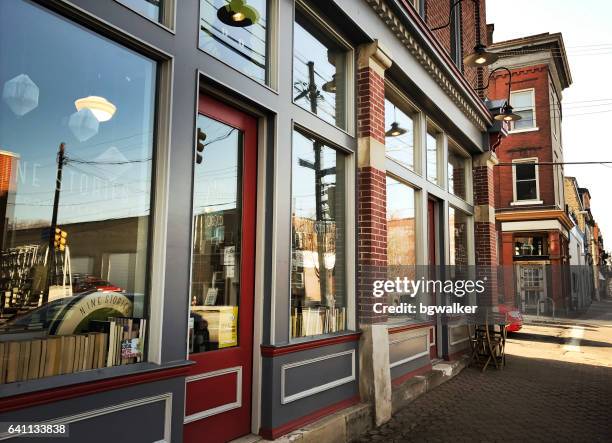 butler street in lawrenceville section of pittsburgh - apple building stock pictures, royalty-free photos & images