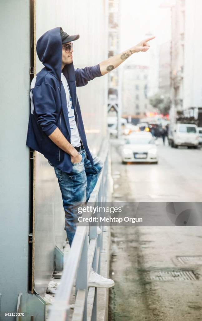 Cool young man, in urban street