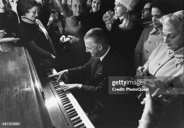 American politician US Vice President Spiro Agnew plays piano for journalists during a coffee hosted by his wife, Washington DC, 1969.