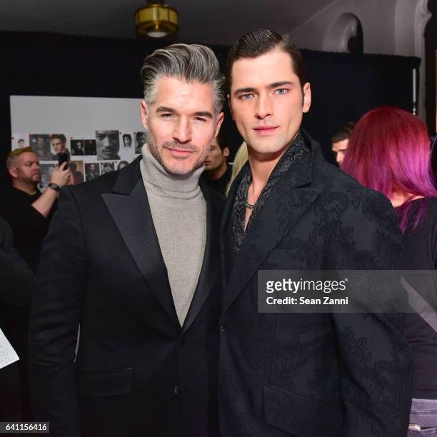 Eric Rutherford and Sean O'Pry attend Joseph Abboud - Front Row - NYFW: Men's at Saint Stephens Church on January 30, 2017 in New York City.