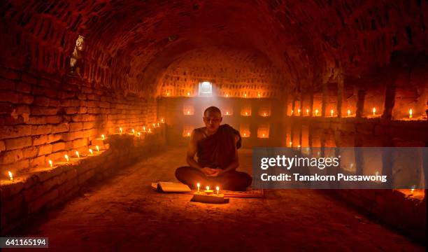 the monk in bagan myanmar - monk stock-fotos und bilder