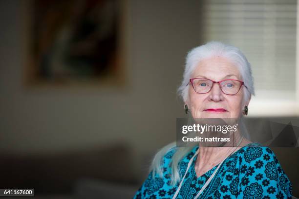 portrait of a senior woman - 80 year old women stock pictures, royalty-free photos & images