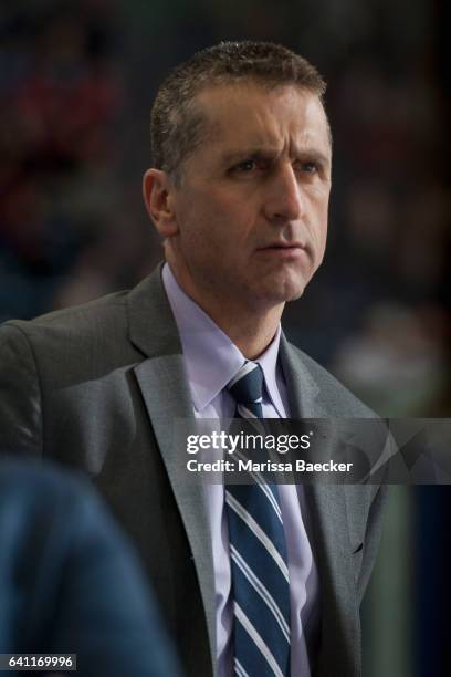 Calgary Hitmen head coach Mark French stands on the bench against the Kelowna Rockets on February 1, 2017 at Prospera Place in Kelowna, British...