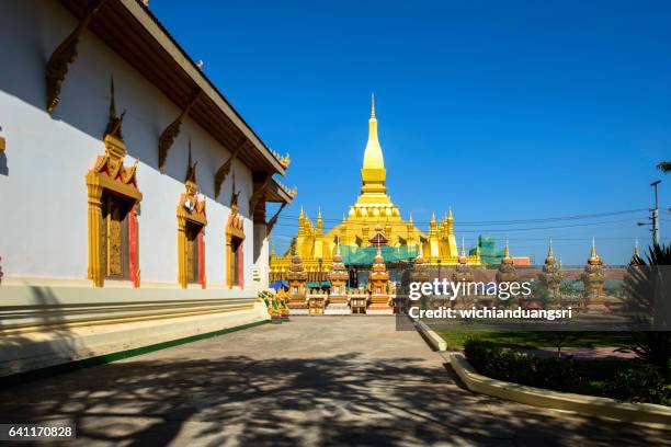 phra that luang temple and landmark in laos - vientiane stock pictures, royalty-free photos & images