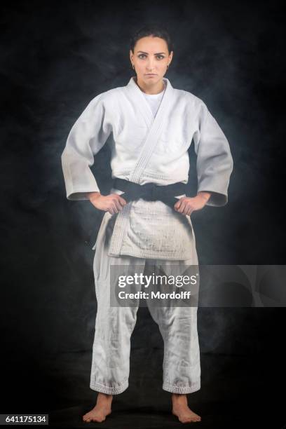 portrait of young female judo master - judo female stock pictures, royalty-free photos & images