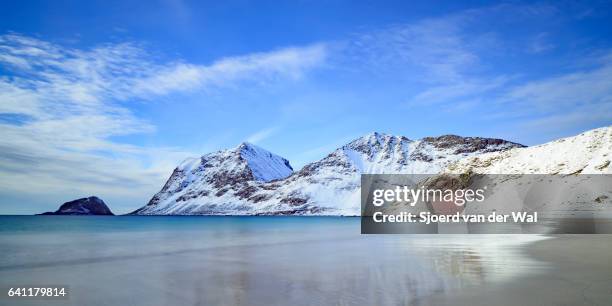 small waves at haukland beach - sjoerd van der wal or sjocar stock pictures, royalty-free photos & images