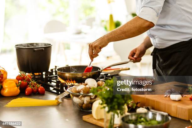 cooking spagheti - italian culture stock pictures, royalty-free photos & images