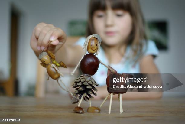 chestnut and acorn stick figures (children and creativity) - diy craft stock pictures, royalty-free photos & images