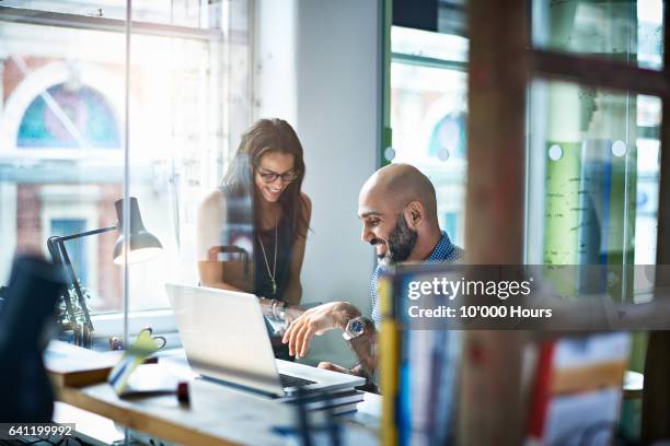 people talking in modern office. - modern business woman stock pictures, royalty-free photos & images