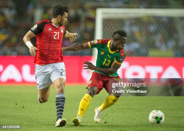 Of Egypt and CHRISTIAN MOUGANG BASSOGOG of Cameroon during the CAN 2017 FINAL between Egypt and Cameroon at Stade de L'Amitie on February 05, 2017 in...