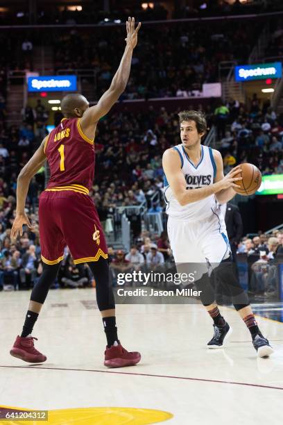 James Jones of the Cleveland Cavaliers attempts to block Nemanja Bjelica of the Minnesota Timberwolves during the first half at Quicken Loans Arena...