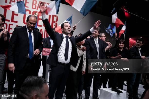 Candidate of the Socialist Party for the 2017 French Presidential Election Benoit Hamon is surrounded by his political supporters during his National...