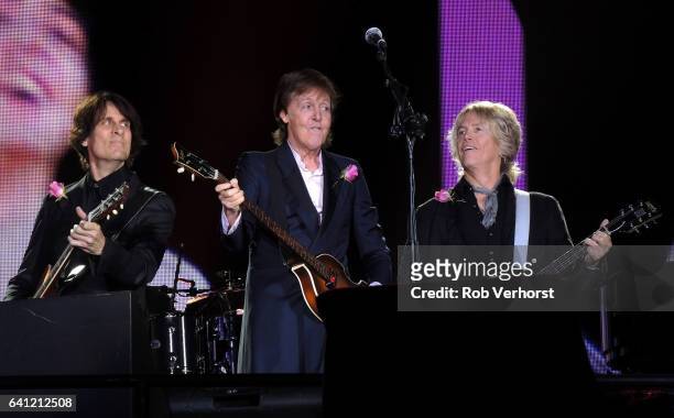 Rusty Anderson, Paul McCartney and Brian Ray perform on stage at Pinkpop festival, Netherlands, 12th June 2016