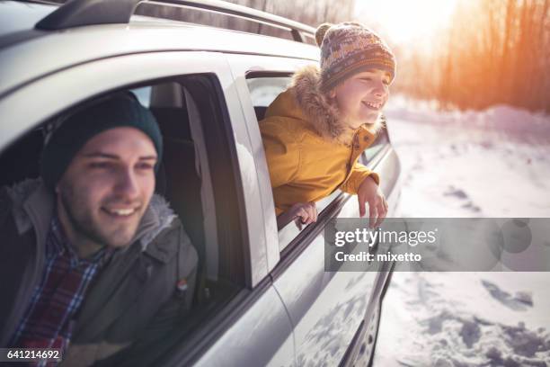 together on the travel - car in winter stock pictures, royalty-free photos & images