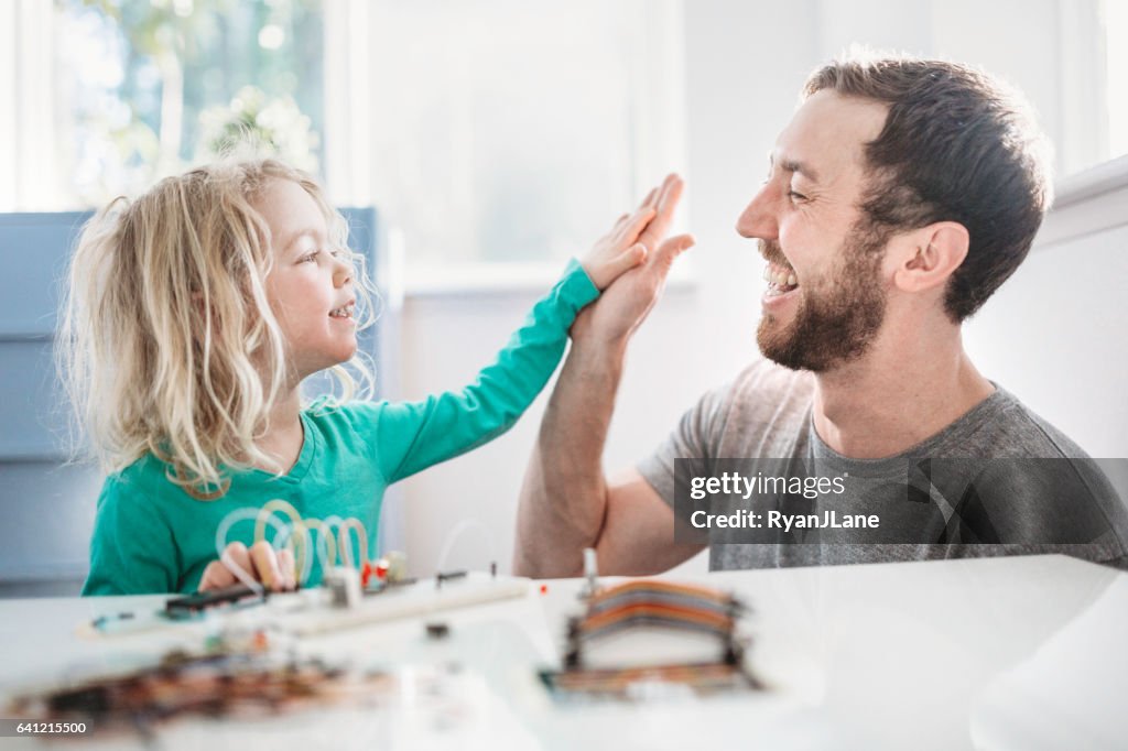 Dad Teaching Daughter Electrical Engineering