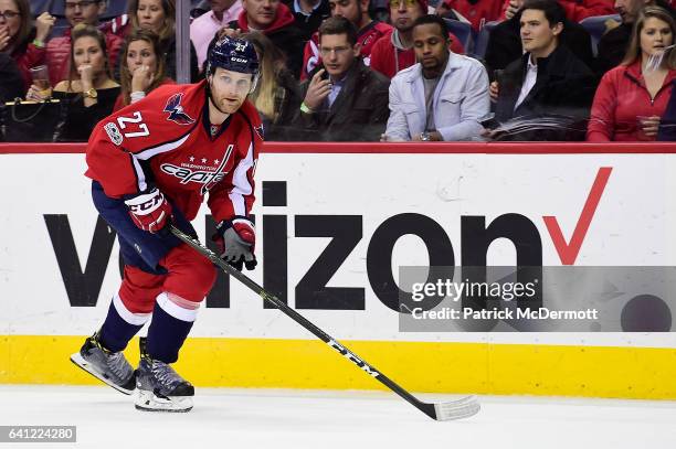 Karl Alzner of the Washington Capitals skates in the second period against the Carolina Hurricanes during an NHL game at Verizon Center on January...