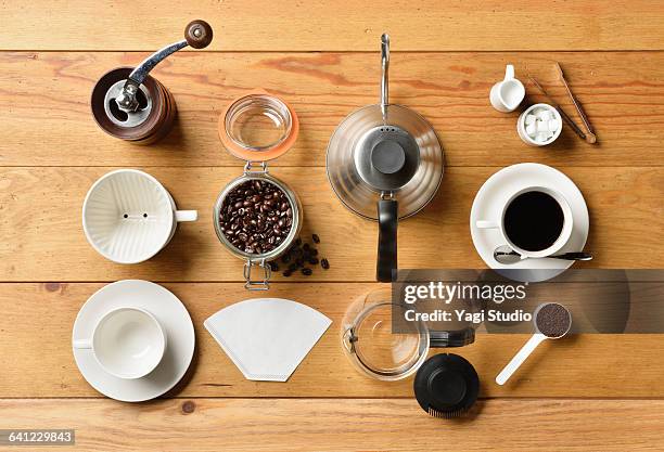 coffee supplies shot knolling style - coffee grinder stock-fotos und bilder