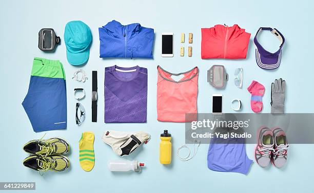 jogging supplies shot knolling style. - outfit stock-fotos und bilder