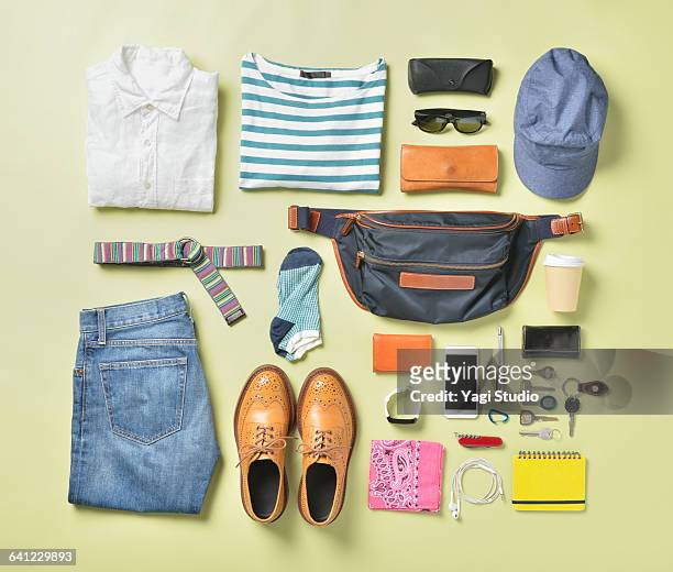 men's daily supplies shot knolling style. - sunglasses overhead fotografías e imágenes de stock