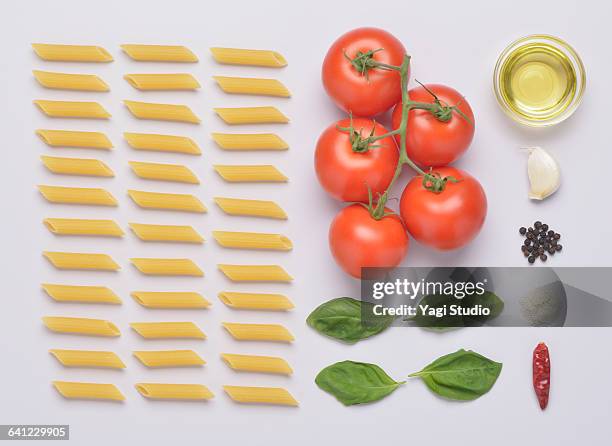 penne with fresh tomato sauce knolling style - penne stock pictures, royalty-free photos & images