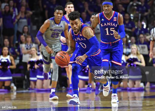 Guard Frank Mason III of the Kansas Jayhawks drives up the court against the Kansas State Wildcats during the first half on February 6, 2017 at...