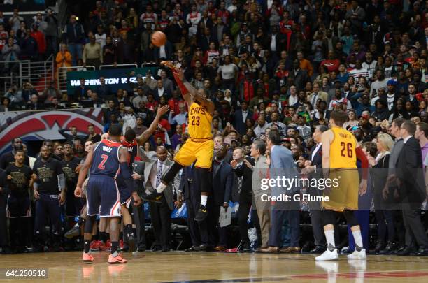 LeBron James of the Cleveland Cavaliers hits a three point shot to force overtime against the Washington Wizards at Verizon Center on February 6,...