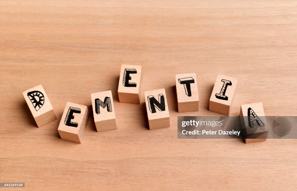 Wooden bricks spelling dementia