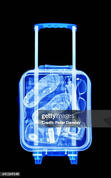mans vacation luggage x-ray - x ray image stock pictures, royalty-free photos & images