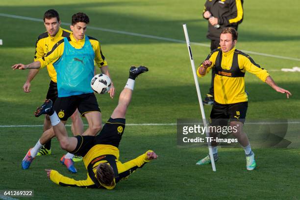 Marc Bartra of Dortmund , Felix Passlack of Dortmund and Mario Goetze of Dortmund battle for the ball during the fifth day of the training camp in...