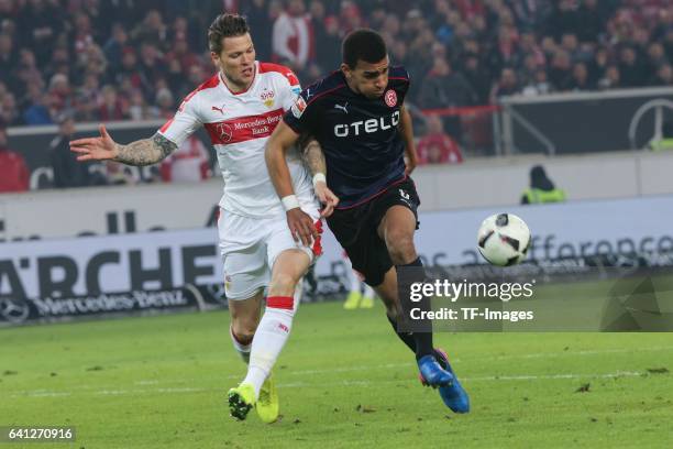 Daniel Gincek of Stuttgart and Kevn Akpoguma of Fortuna Duesseldorf battle for the ball during the Second Bundesliga match between VfB Stuttgart and...