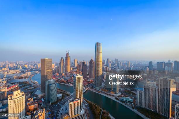 tianjin skyline at sunset - tianjin stock pictures, royalty-free photos & images