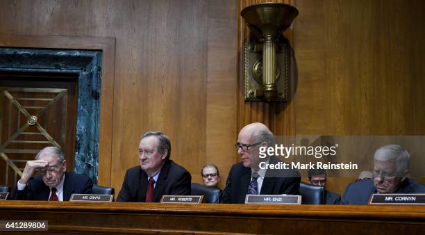 American politicians, from left, US Senators Chuck Grassley, Mike Crapo, Pat Roberts, and Mike Enzi attend a Senate Finance Committee hearing,...