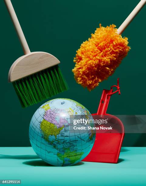 globe with cleaning tools - dustpan and brush fotografías e imágenes de stock