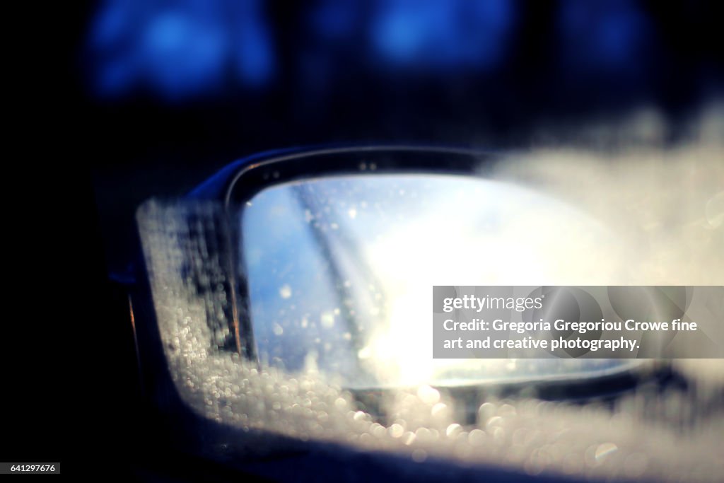 Reflection In Car Side Mirror