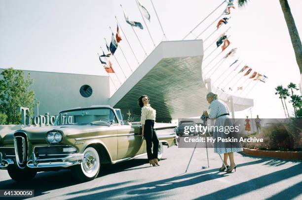 Actress and model Kitty Dolan poses for a portrait next to a 1958 Ford Edsel Citation outside The Tropicana Hotel circa 1958 in Las Vegas, Nevada.