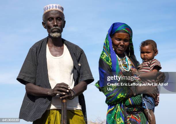 Issa tribe man with his wife and child on January 14, 2017 in Yangudi Rassa National Park, Ethiopia.