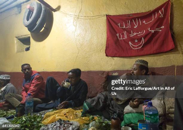 Ethiopian people chewing khat during a sufi ceremony lead by Amir Redwan in Ummi Tahir Nabigar on January 12, 2017 in Harar, Ethiopia.