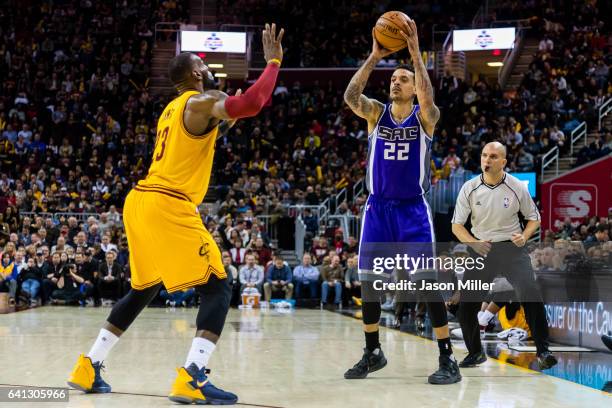 LeBron James of the Cleveland Cavaliers puts pressure on Matt Barnes of the Sacramento Kings during the second half at Quicken Loans Arena on January...