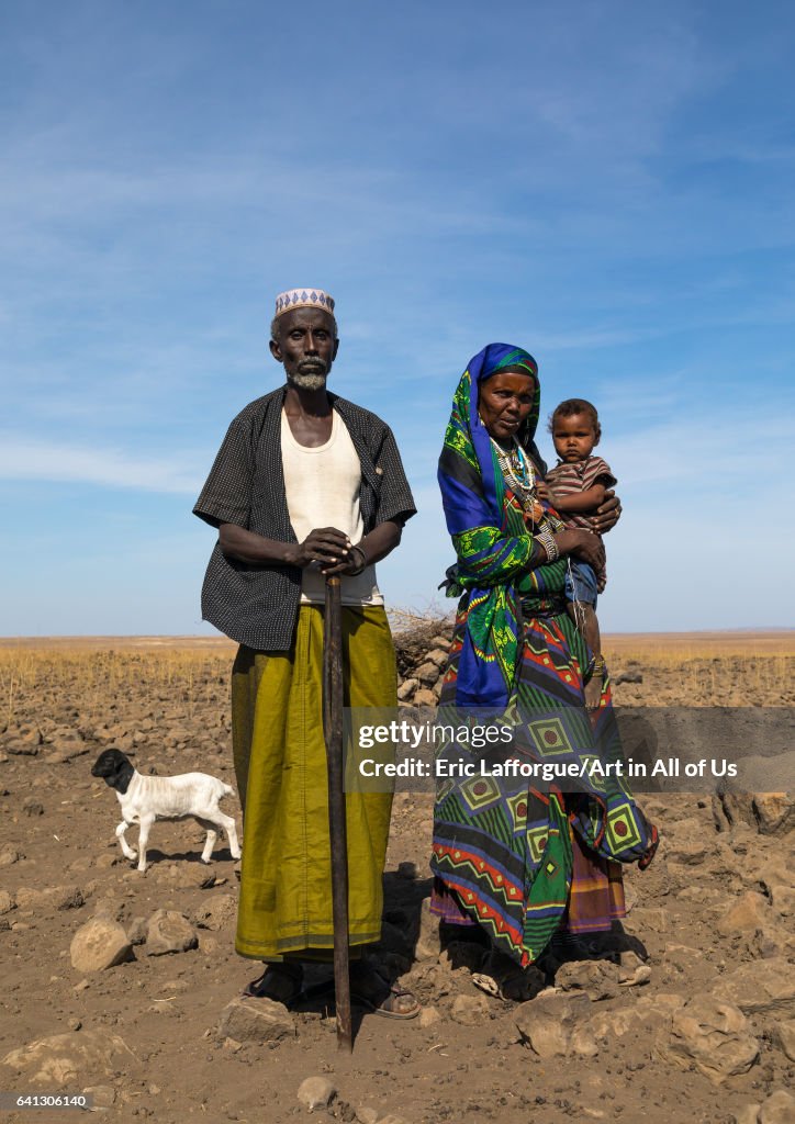 Issa tribe man with his wife and child on January 14, 2017 in Yangudi ...