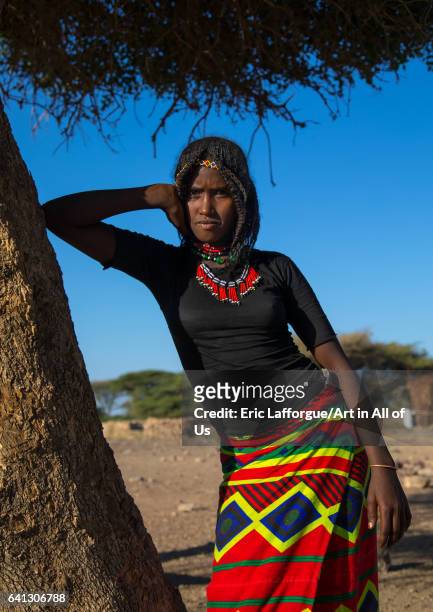 Portrait of an Afar tribe girl with braided hair on January 17, 2017 in Chifra, Ethiopia.