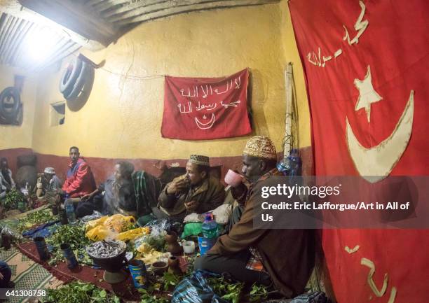 Ethiopian people chewing khat during a sufi ceremony lead by Amir Redwan in Ummi Tahir Nabigar on January 12, 2017 in Harar, Ethiopia.