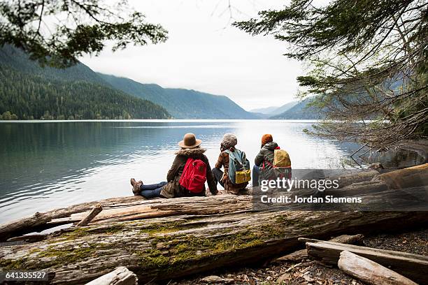 three girls on a day hike. - friends hiking stock pictures, royalty-free photos & images