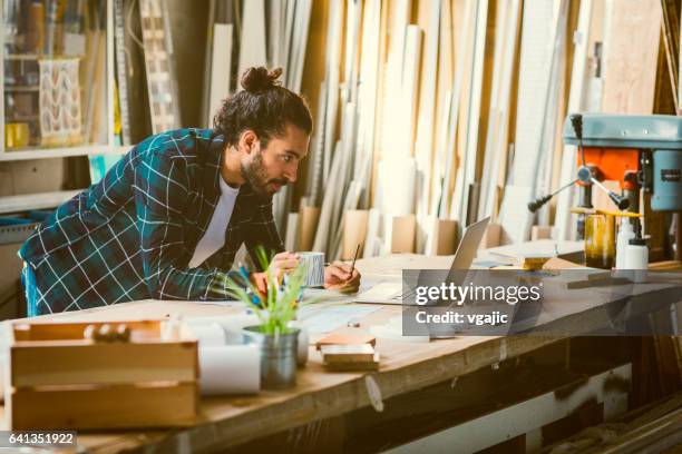 male carpenter working in his workshop - small business or entrepreneur stock pictures, royalty-free photos & images