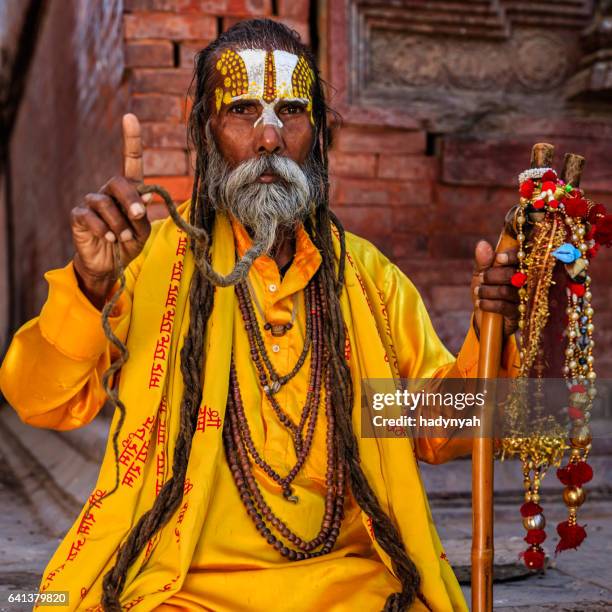sadhu - indian holyman sitting in the temple - hinduism stock pictures, royalty-free photos & images