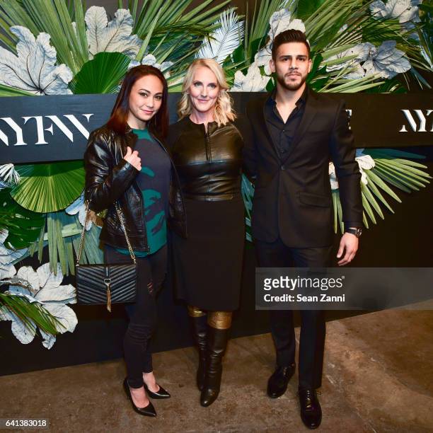 Michelle Waterson, Catherine Bennett and Yair Rodriguez attend ELLE, E! And IMG Host New York Fashion Week February 2017 Kick-Off Event at 40 Bethune...