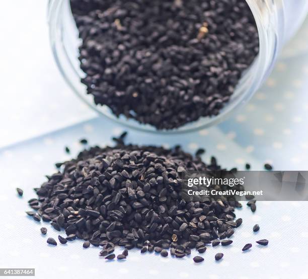 nigella seeds - nigella stock pictures, royalty-free photos & images