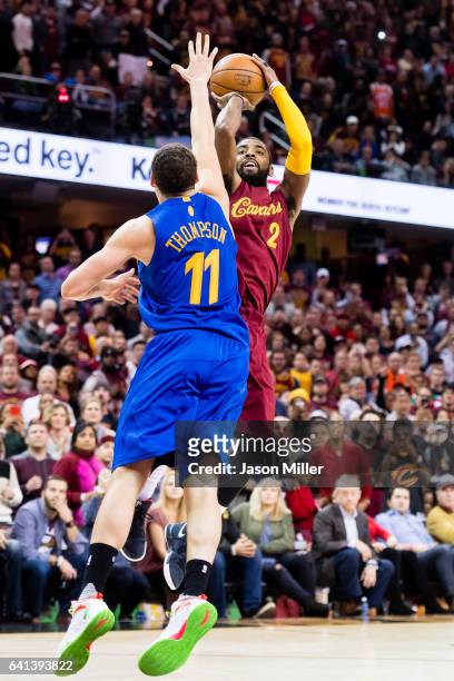 Kyrie Irving of the Cleveland Cavaliers shoots over Klay Thompson of the Golden State Warriors to win the game in the final seconds at Quicken Loans...